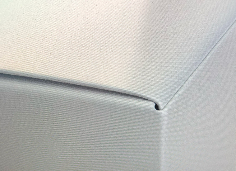 Up close on a high-resolution 3D model of a box corner.