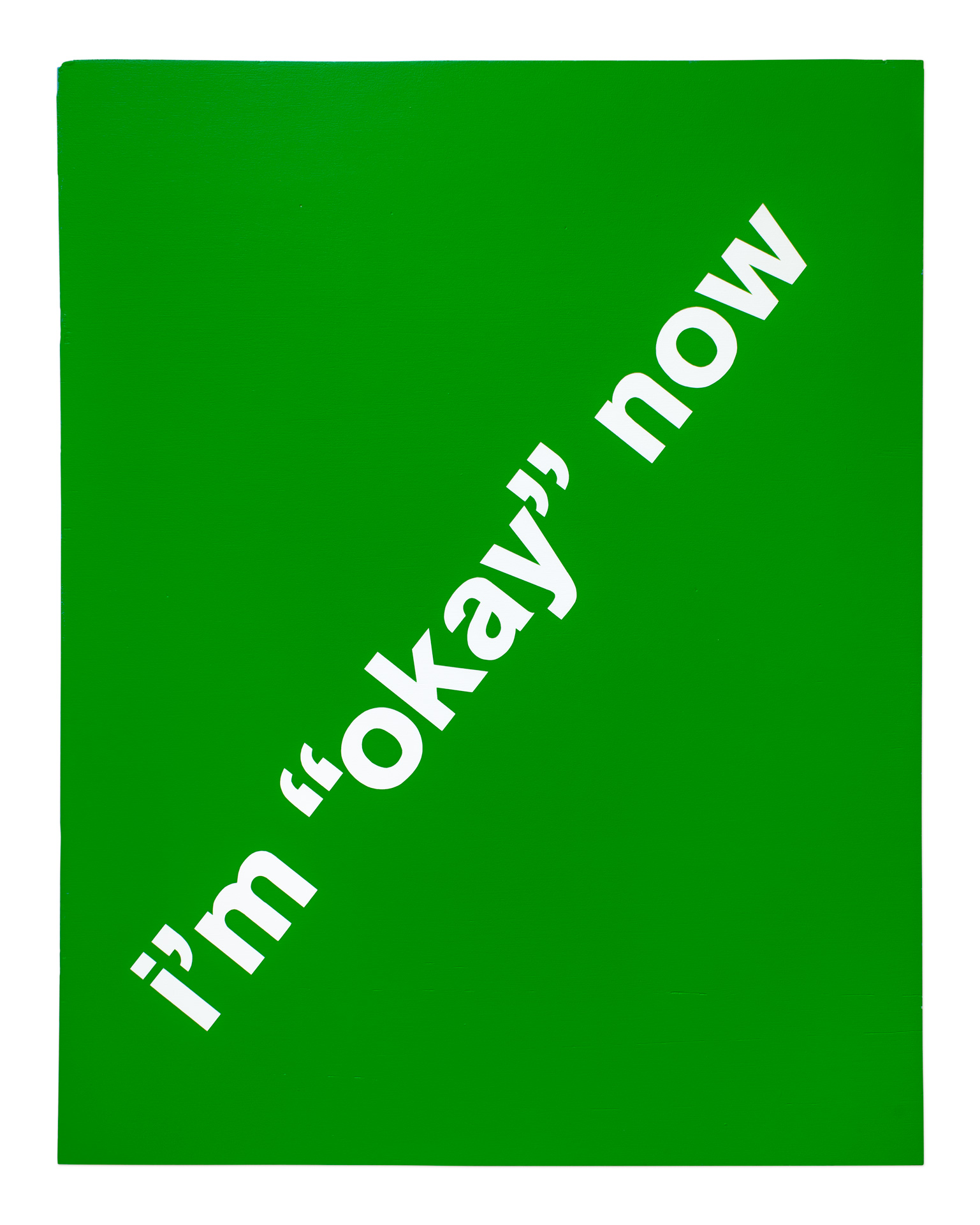A painting with a solid green background and the words ”I'm 'okay' now!“ in bold white lettering – on a wood canvas.